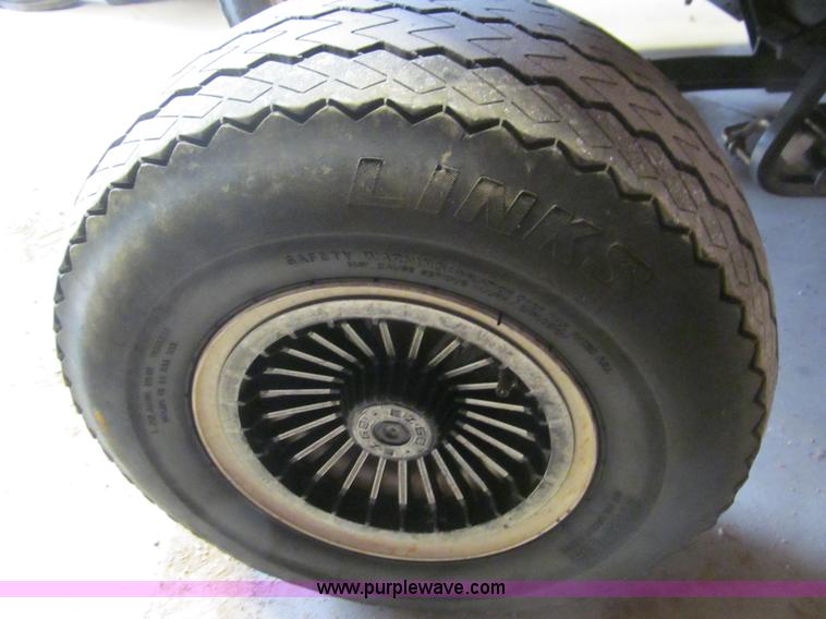 image for item E7567 EZ GO golf cart