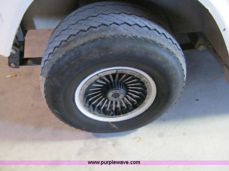 image for item E7567 EZ GO golf cart