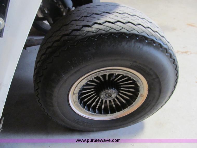 image for item E7567 EZ GO golf cart