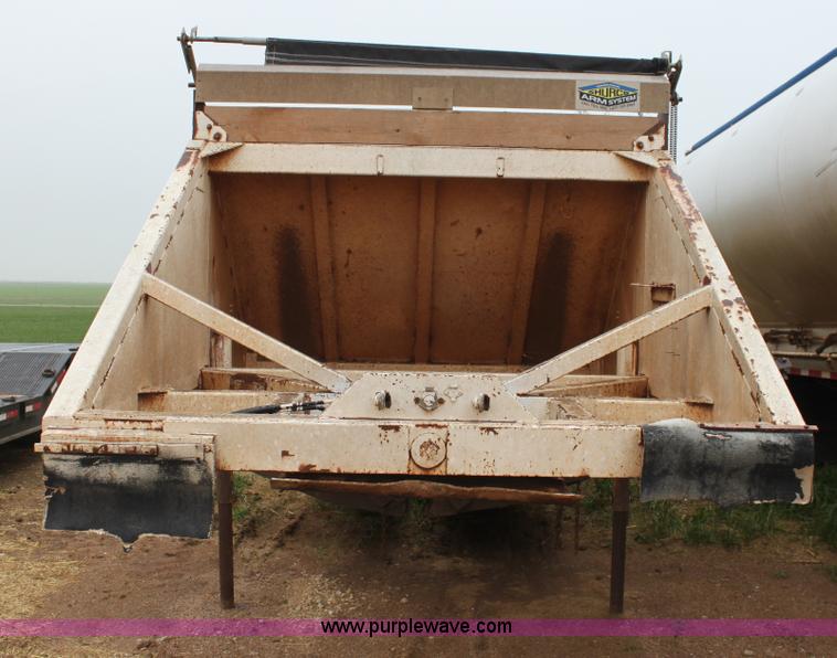 image for item F8611 1986 Bronson belly dump trailer