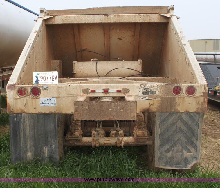 image for item F8611 1986 Bronson belly dump trailer