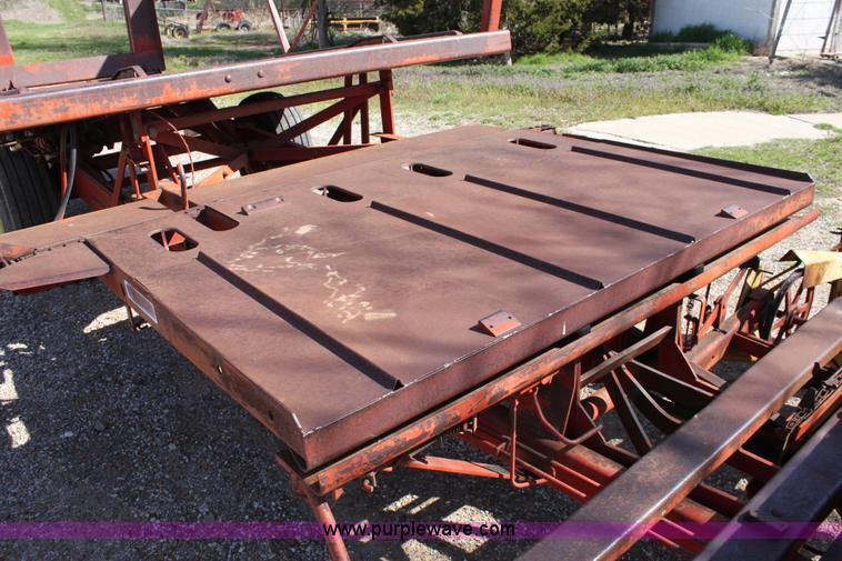 image for item F8623 New Holland 1010 small square bale stack wagon