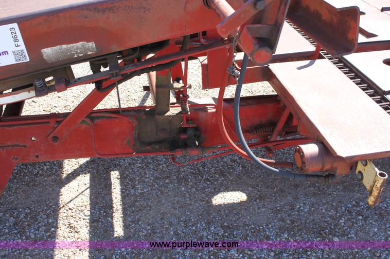 image for item F8623 New Holland 1010 small square bale stack wagon