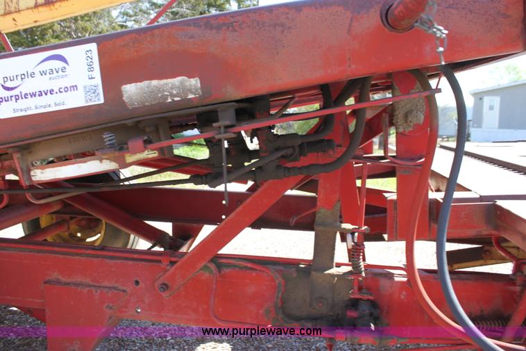 image for item F8623 New Holland 1010 small square bale stack wagon