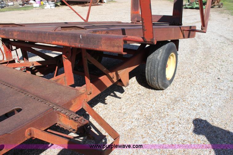 image for item F8623 New Holland 1010 small square bale stack wagon