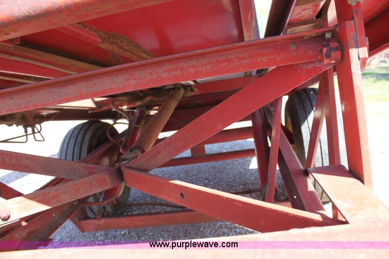 image for item F8623 New Holland 1010 small square bale stack wagon