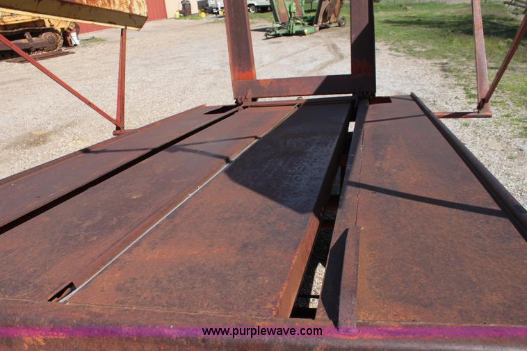 image for item F8623 New Holland 1010 small square bale stack wagon