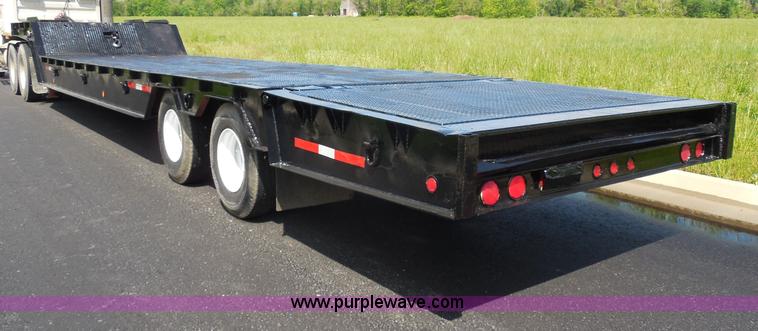 image for item H3195 1977 Multiquip hydraulic dovetail lowboy trailer