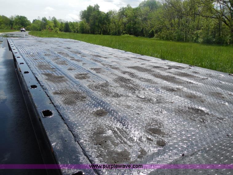 image for item H3195 1977 Multiquip hydraulic dovetail lowboy trailer