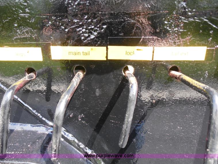 image for item H3195 1977 Multiquip hydraulic dovetail lowboy trailer