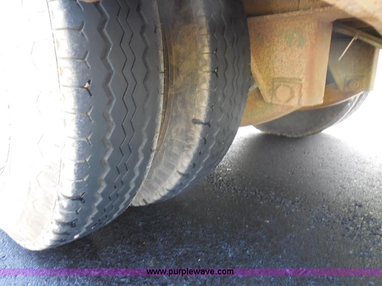 image for item H3195 1977 Multiquip hydraulic dovetail lowboy trailer