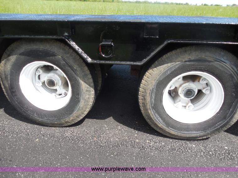 image for item H3195 1977 Multiquip hydraulic dovetail lowboy trailer