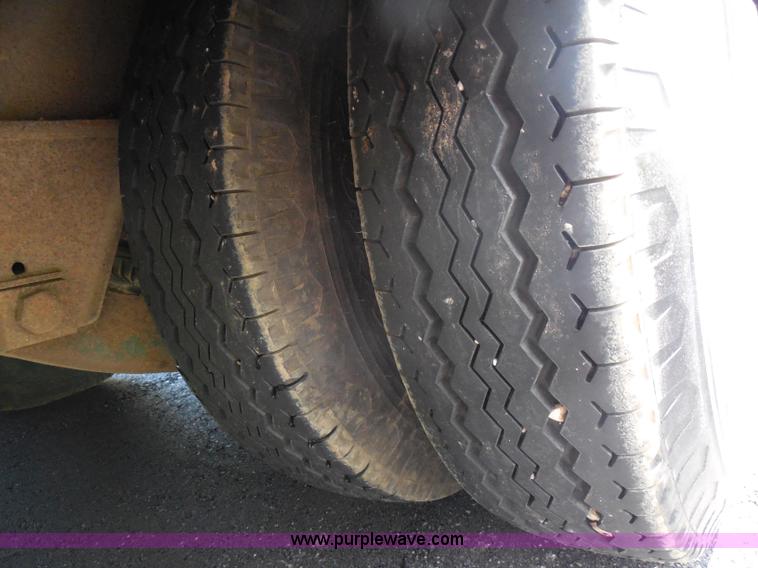 image for item H3195 1977 Multiquip hydraulic dovetail lowboy trailer