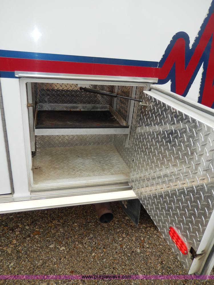 image for item D8062 2003 Ford 801 ambulance