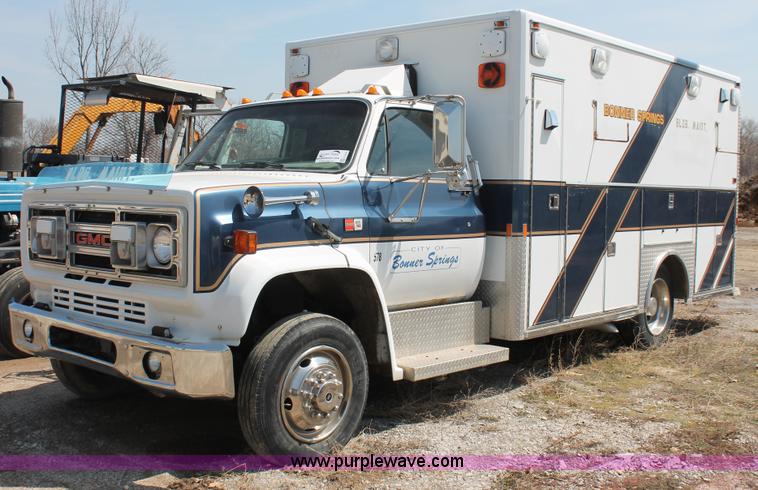 image for item E3335 1989 GMC TopKick 7000 EMS building maintenance truck