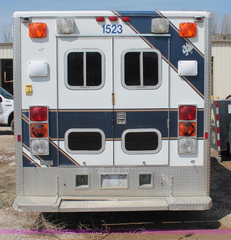 image for item E3335 1989 GMC TopKick 7000 EMS building maintenance truck