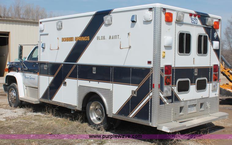 image for item E3335 1989 GMC TopKick 7000 EMS building maintenance truck