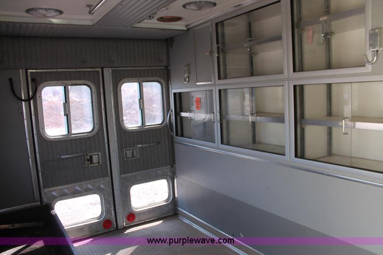 image for item E3335 1989 GMC TopKick 7000 EMS building maintenance truck