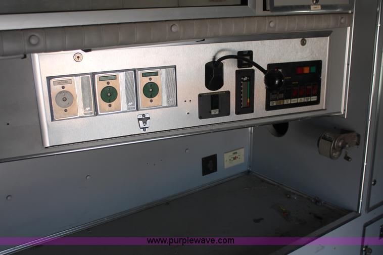 image for item E3335 1989 GMC TopKick 7000 EMS building maintenance truck