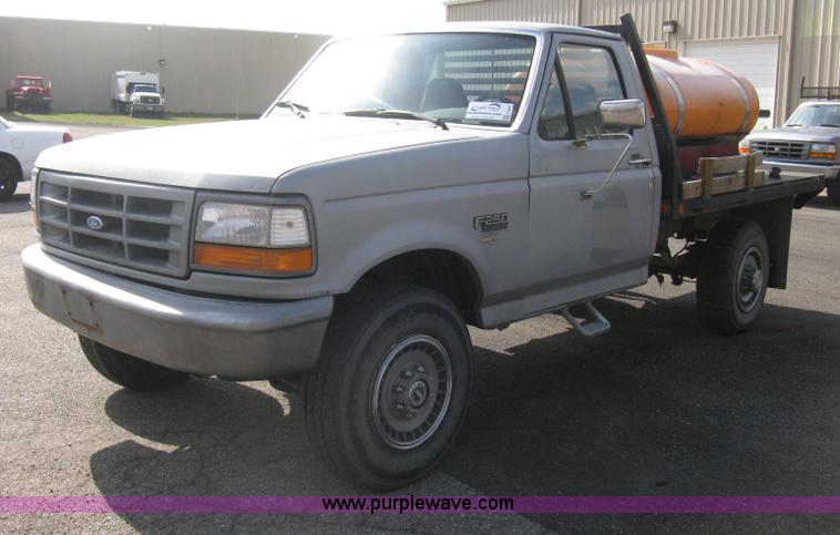 image for item E3481 1993 Ford F250 XL flatbed truck