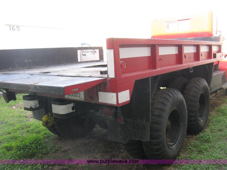 image for item E3487 1969 Jeep M813 flatbed truck