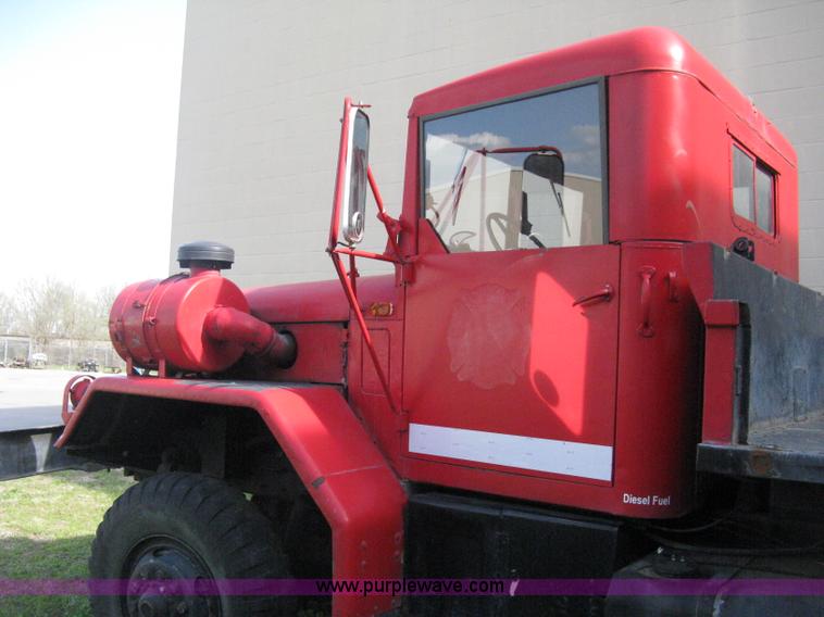 image for item E3487 1969 Jeep M813 flatbed truck