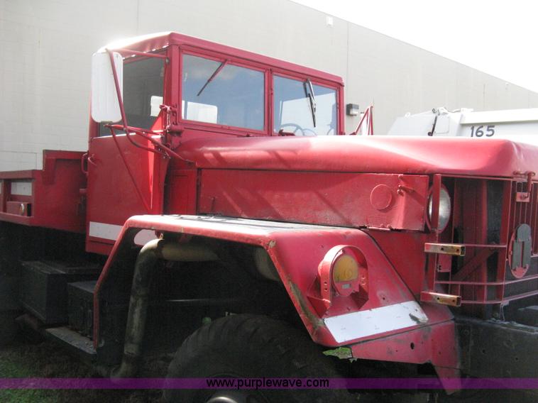 image for item E3487 1969 Jeep M813 flatbed truck