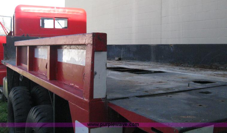 image for item E3487 1969 Jeep M813 flatbed truck