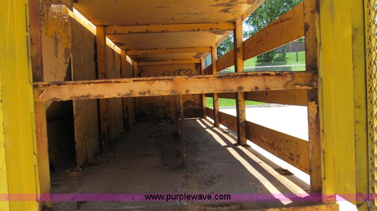 image for item E3946 1993 International 4900 flatbed truck water truck