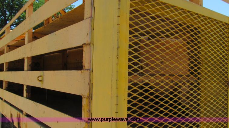 image for item E3946 1993 International 4900 flatbed truck water truck