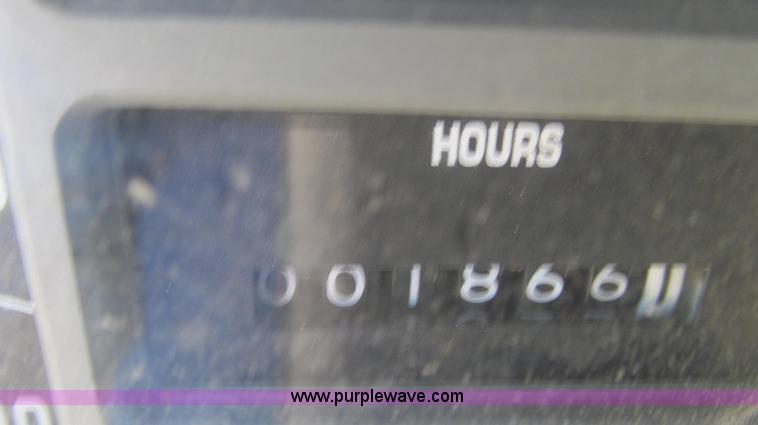 image for item E3946 1993 International 4900 flatbed truck water truck