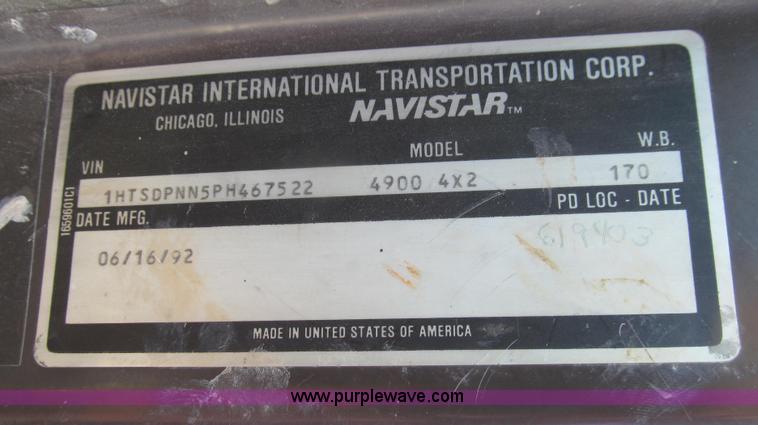 image for item E3946 1993 International 4900 flatbed truck water truck