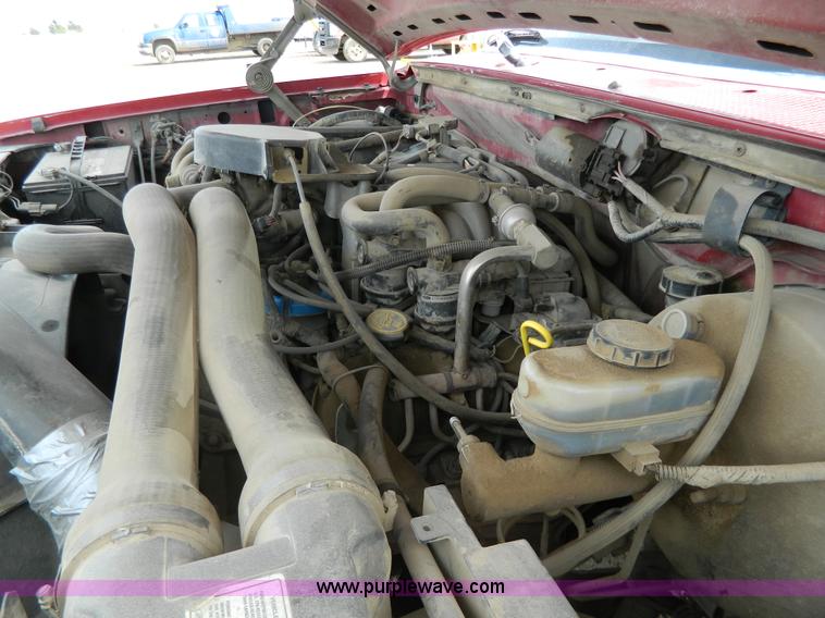 image for item G7836 1989 Ford F350 flatbed pickup truck