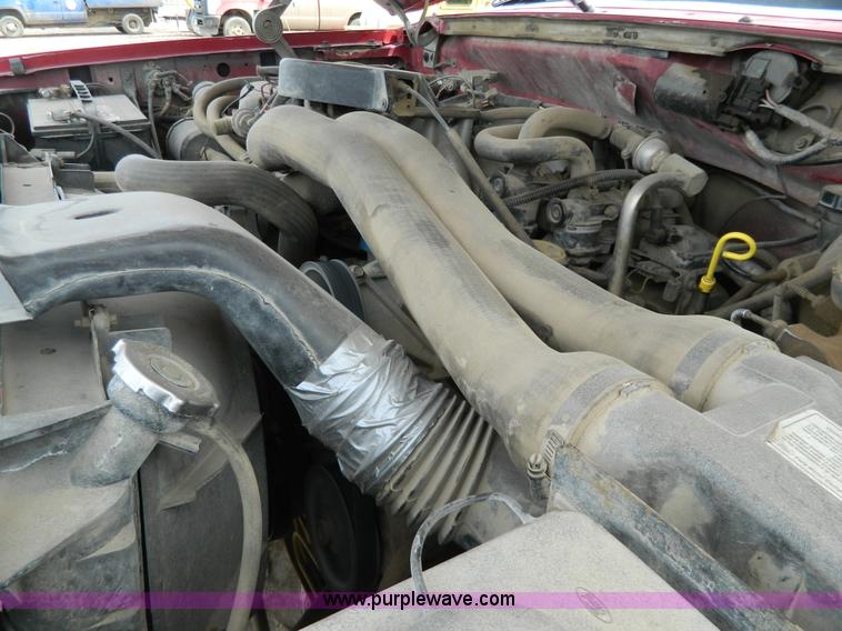 image for item G7836 1989 Ford F350 flatbed pickup truck