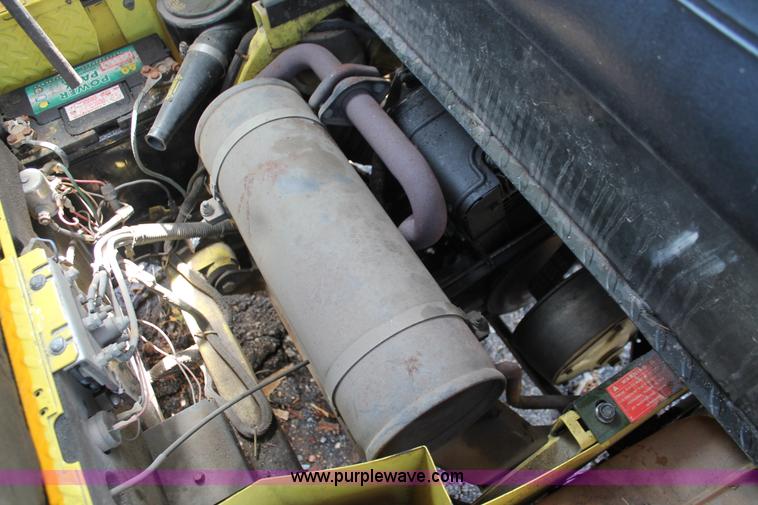 image for item AH9140 EZ-Go gas powered golf cart