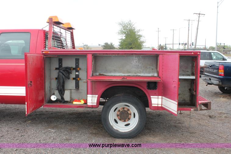 image for item D8206 1999 Ford F550 XL Super Duty Crew Cab utility truck