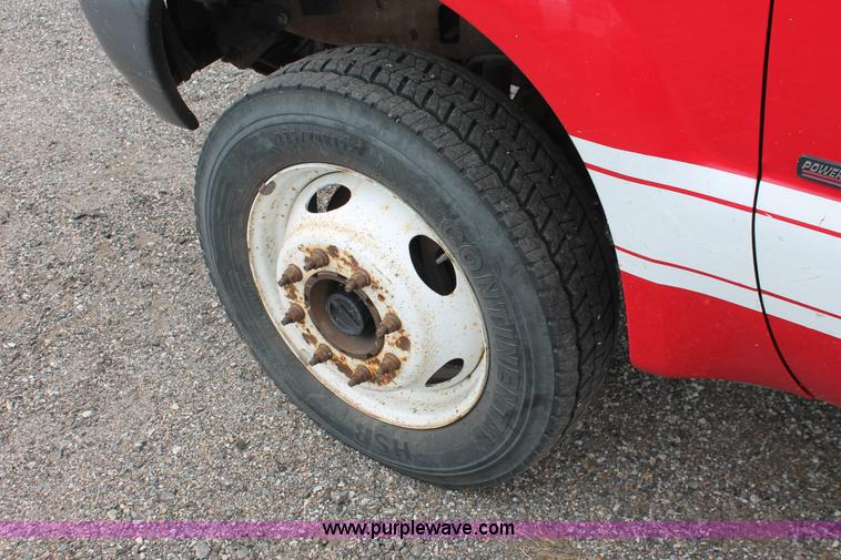 image for item D8206 1999 Ford F550 XL Super Duty Crew Cab utility truck