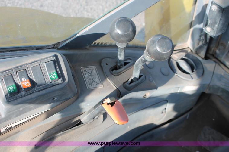 image for item D8247 2000 New Holland LB75 backhoe