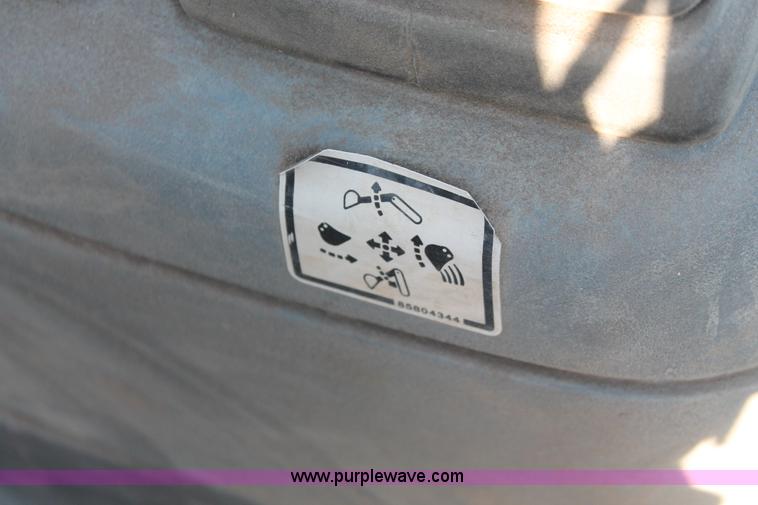 image for item D8247 2000 New Holland LB75 backhoe