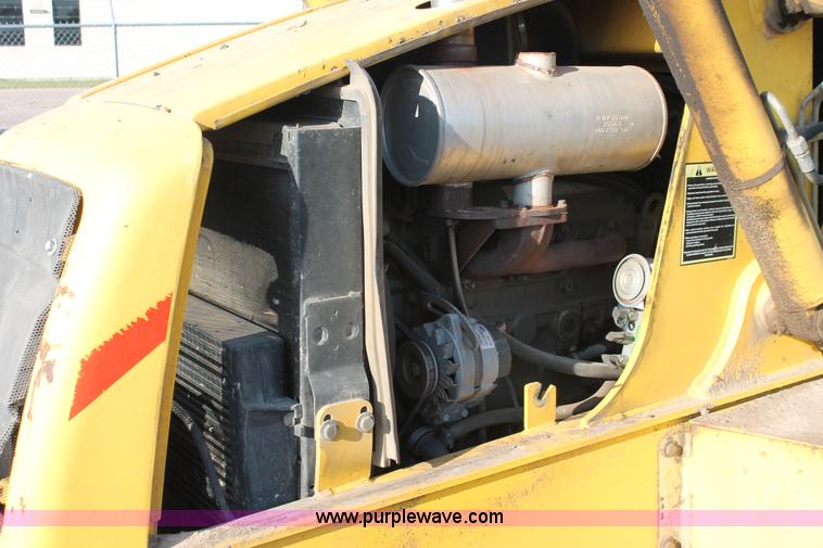 image for item D8247 2000 New Holland LB75 backhoe