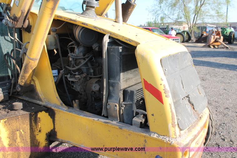 image for item D8247 2000 New Holland LB75 backhoe
