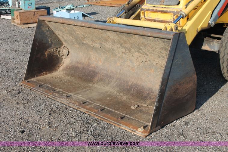 image for item D8247 2000 New Holland LB75 backhoe