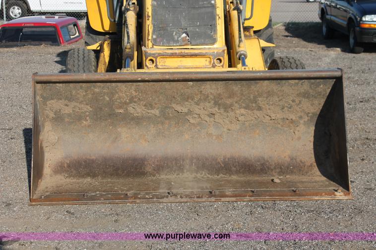 image for item D8247 2000 New Holland LB75 backhoe