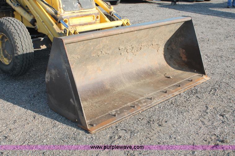 image for item D8247 2000 New Holland LB75 backhoe