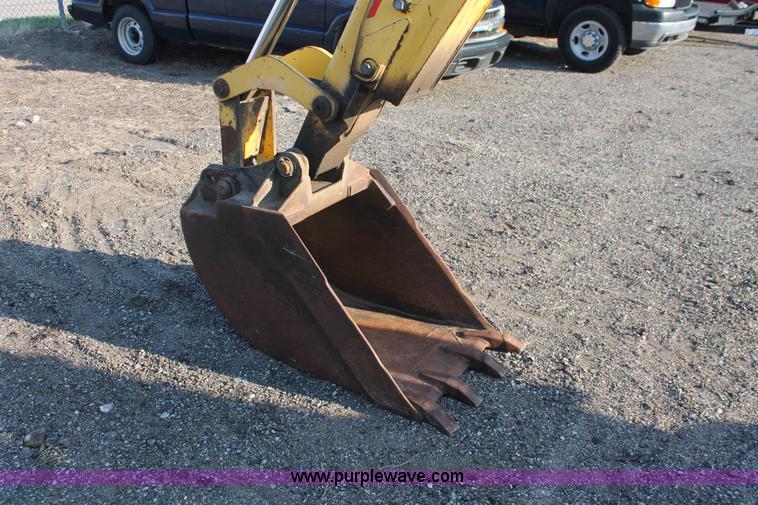 image for item D8247 2000 New Holland LB75 backhoe