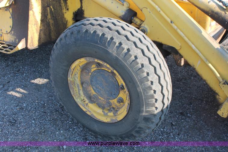 image for item D8247 2000 New Holland LB75 backhoe