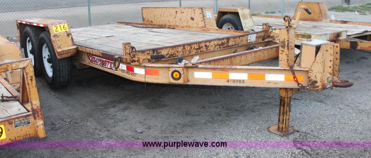image for item D8261 2001 Towmaster T-12DDT tilt deck trailer