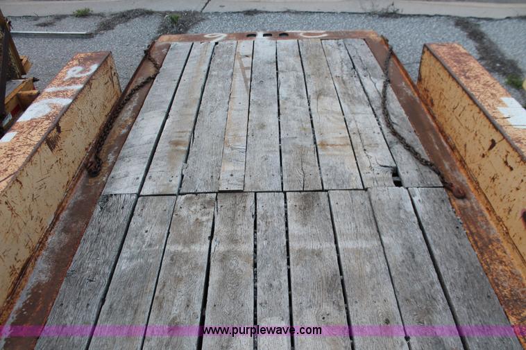 image for item D8261 2001 Towmaster T-12DDT tilt deck trailer