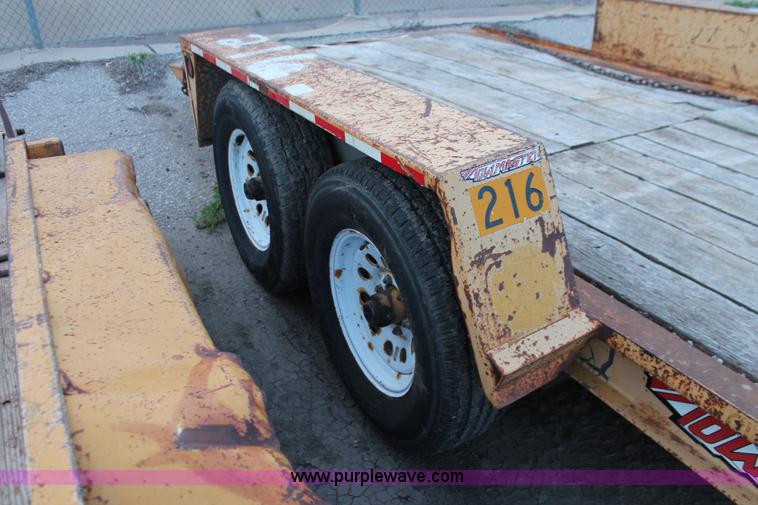 image for item D8261 2001 Towmaster T-12DDT tilt deck trailer