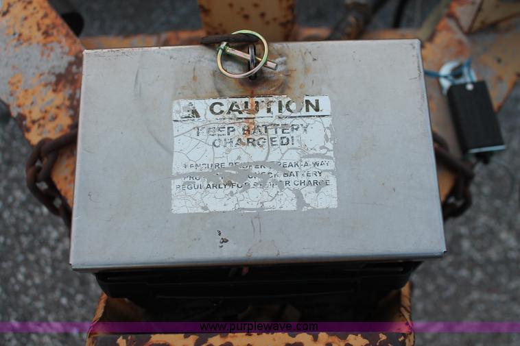 image for item D8261 2001 Towmaster T-12DDT tilt deck trailer